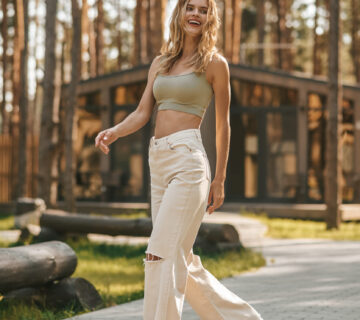 Woman with restored energy walking outdoors, representing recovery from chronic fatigue through functional medicine in Plano TX